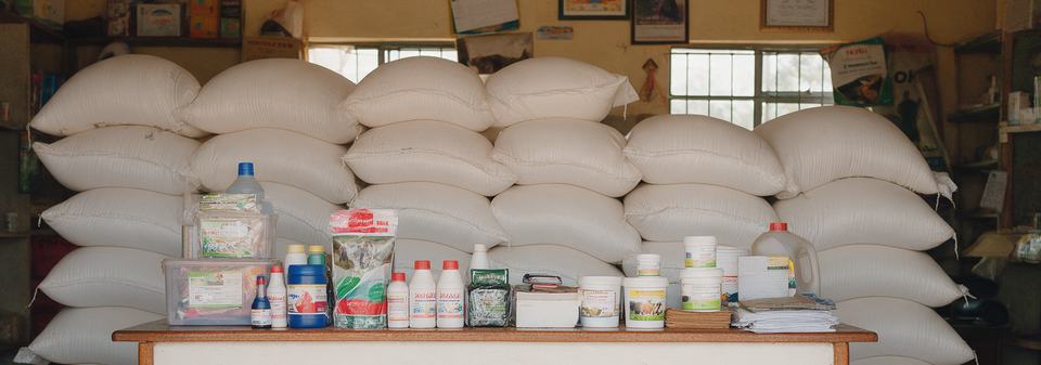 Sacks of feed and products on a shop counter